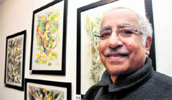 Veteran artist Phalguni Dasgupta at his exhibition of water colour paintings in Dehradun on Sunday.