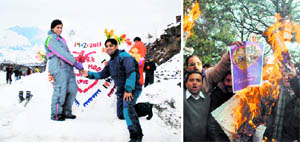 Newly-weds celebrate Valentines Day in the fresh snow, near Nehru Kund on the Manali Rohtang pass on Monday; and (right) Bajrang Dal activists burn posters during a protest against Valentines Day celebrations in Shimla on Monday.