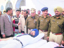 Simardeep Singh, SP, Kaithal, donates blood at a camp in Kaithal. 