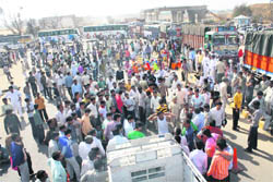 Farmers block the Delhi-Jaipur NH-8 in protest against the acquisition.