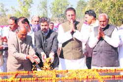 Haryana minister Randeep Singh Surjewala and other dignitaries pay floral tributes at the samadhi of former Haryana Speaker Ishwar Singh