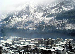 A fresh spell of snow envelopes the tourist town of Manali on Tuesday