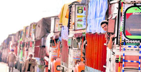 Trucks standed at the Narwal bypass on the Srinagar-Jammu National Highway on Tuesday.