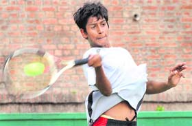 A player in action during the CLTA-AITA tennis tournament in Chandigarh