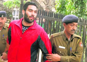 The accused being taken to court