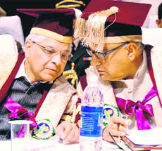 Union Minister of State for Science and Technology Ashwani Kumar and Chief Minister BS Hooda at the GJU convocation in Hisar on Wednesday.