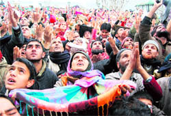 Devotees offer prayers on Eid-i-Milad-un-Nabi at the Hazratbal shrine in Srinagar on Wednesday