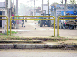 The blocked entry and exit points of the road leading to Jaipura village.