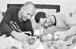 Gay couple Mauro and Juan with female twins in New Delhi.
