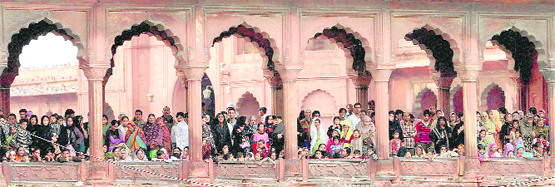 Muslims watch a procession on the occasion of Eid-i-Milad-un-Nabi, the birth anniversary of Prophet Mohammad, from the corridors of the Jama Masjid in New Delhi 