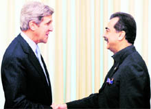 US Senator John Kerry (left) shakes hands with Pakistan Prime Minister Yousuf Raza Gilani in Islamabad on Wednesday