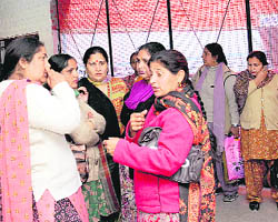 Shocked teachers at GSSS, Sector 45, Chandigarh, on Thursday.