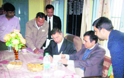 Naresh Katyal, additional district and sessions judge, Kaithal, and Rajan Walia, additional civil judge, senior division, settle cases at a Gramin Lok Adalat held in Jajanpur village of Kaithal