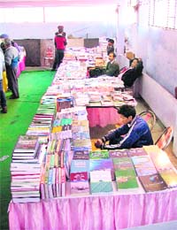 NO TAKERS: Exhibitors sit idle at the book fair organised at Punjab Agricultural University in Ludhiana
