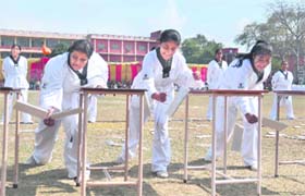 Girls display their martial skills on the concluding day of the 50th Annual Athletics Meet of the Khalsa College for Women in Ludhiana