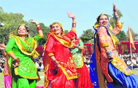 Girls perform giddha