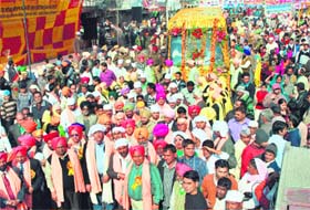 A religious procession being taken out on the eve of Ravidas Jayanti in Ludhiana