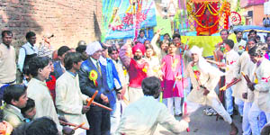 A procession being taken out on the eve of Ravidass Jayanti in Dehradun on Thursday