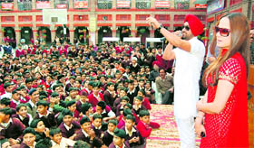 Actors Daljit Singh and Puja Tandon promote their film The Lion of Punjab at DAV School in Amritsar.