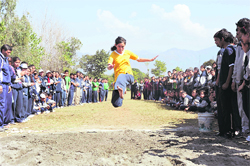 A student participates in the long jump event at the sardar Bhagwan singh Institute of Biomedical sciences at balawala near dehradun on Friday.<p> 