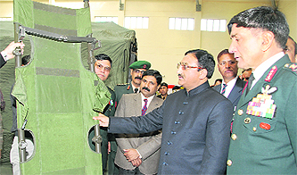 Uttarakhand Chief Minister Ramesh Pokhriyal Nishank with Army officers at a seminar in Dehradun on Friday.