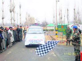 An Army officer flags off a national integration tour for Gujjars and Bakarwals in Srinagar. Tribune photo