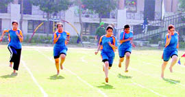 Students of the DD Jain College of Education participate in a 200m race on the annual athletics meet in Ludhiana on Friday.