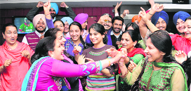 Cricket buffs rejoice after Indias victory over Bangladesh at a hotel in Sector 35, Chandigarh, on Saturday. 