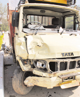 The mangled remains of the motorcycle that was hit by a mini-truck (right) on the Ramgarh-Panchkula road on Friday night.