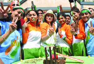 Models strike a pose as India played its first World Cup cricket match against Bangladesh on Saturday.