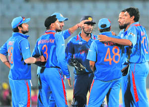 Indian cricketers celebrate the dismissal of Bangladesh captain Shakib Al Hasan at The Sher-e Bangla Stadium in Mirpur on Saturday. India won by 87 runs.