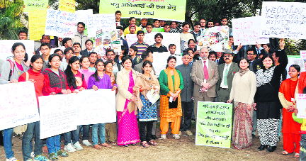 A rally being taken out against cruelty to animals in Dehradun on Saturday.