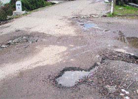 Water accumulated on a road due to pipe leakage