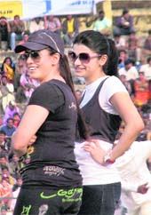 Actors Mahima Chaudhary (L) and Prachi Desai during the Tollywood Vs Bollywood exhibition cricket match in Siliguri on Sunday.