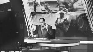 Announcer Abdul Samad Nasser is seen in the studio of the Arabic Al Jazeera satellite news channel in Doha.