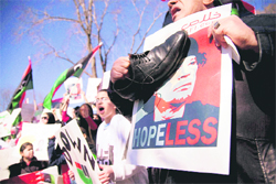 Demonstrators gather near the White House in Washington in a show of solidarity with the Libyan protesters on Saturday. 