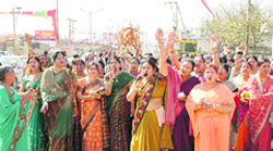 Women participate in a Jain community shobha yatra taken out in Dehradun 