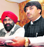 Members of the Sikh Sevak Jatha address a press conference in Dehradun
