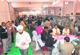 Employees count the ballot papers in Bahadrabad division in Haridwar