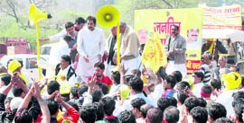 HJC chief Kuldeep Bishnoi leads the tractor yatra in Panchkula on Monday.