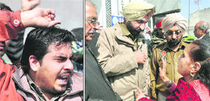Bharat Bhushan, father of the baby, protests against the hospital administration; and (right) Neelam Rani, grandmother of the child, argues with the police in Ludhiana on Monday. 