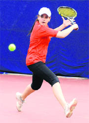 A player in action during a match at the North East Zone Inter-University Lawn Tennis Championship in Chandigarh on Tuesday. A Tribune photograph