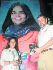 Jean Pierre Harrison, husband of Kalpana Chawla, releases a book on the biography of Dr Kalpana Chawla, along with Kalpana Chawlas sister, at PEC in Chandigarh on Tuesday.