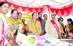 Harbans Kapoor, Assembly Speaker, along with members of the Ladies Club in Dehradun on