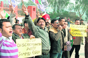 Activists of the J&K National Panthers Party hold a demonstration in Jammu on Tuesday.