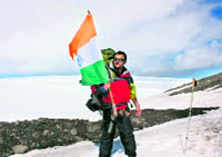 Aditya Dada waves the Indian flag in Antarctica