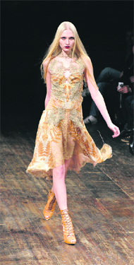 A model presents a creation from the Julien MacDonald Fall/Winter 2011 collection at London Fashion Week.