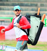 MS Dhoni arrives for net practice in Bangalore on Tuesday.