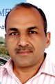 Rakesh Kumar with his book