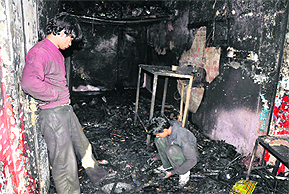 ALL THAT IS LEFT: A scooter mechanic shop, which was gutted after fire broke out at Burail village in Sector 45, Chandigarh, on Wednesday.